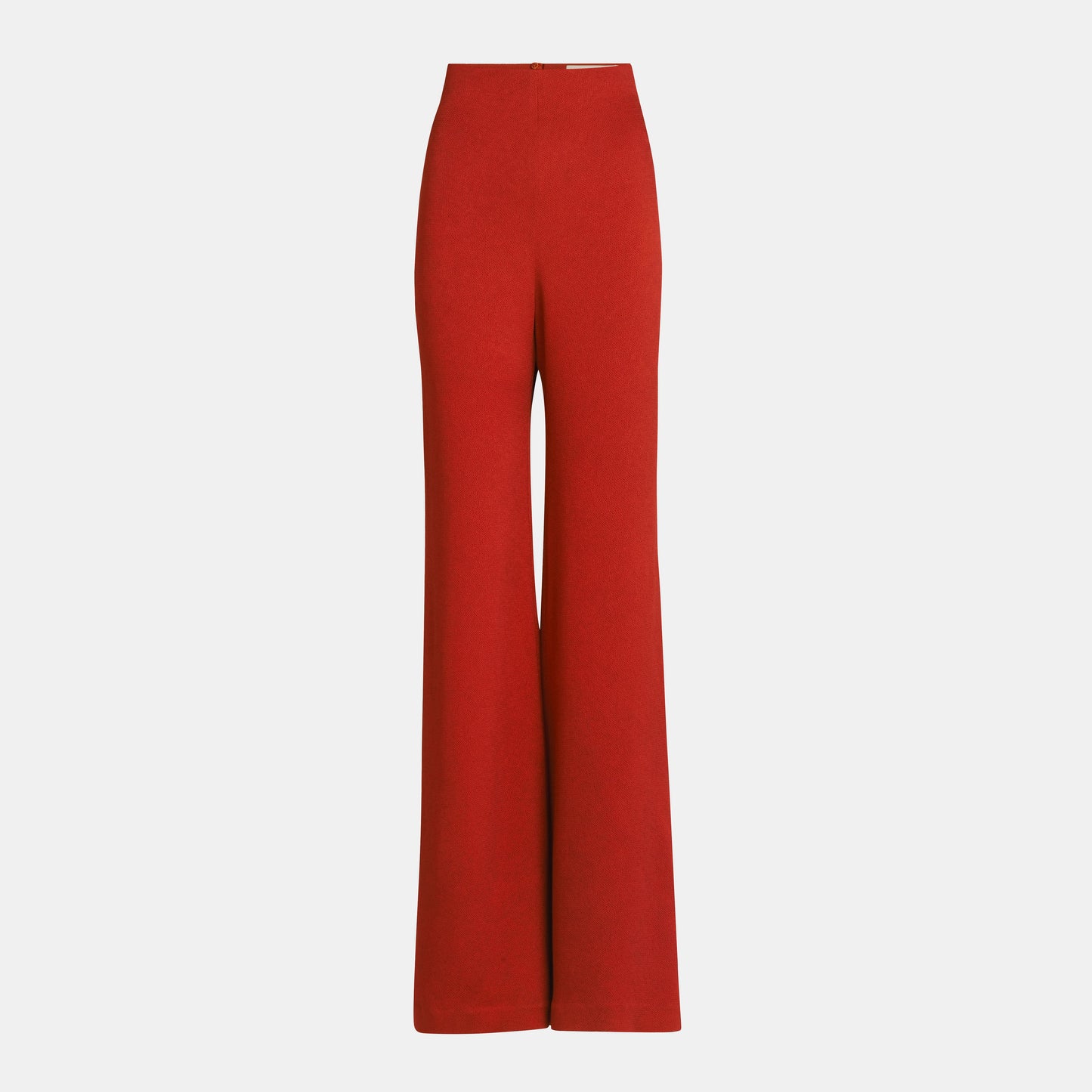 El Palermo Pant, un pantalón de tiro alto y bota ancha en tela italiana roja, se exhibe sobre un fondo blanco.