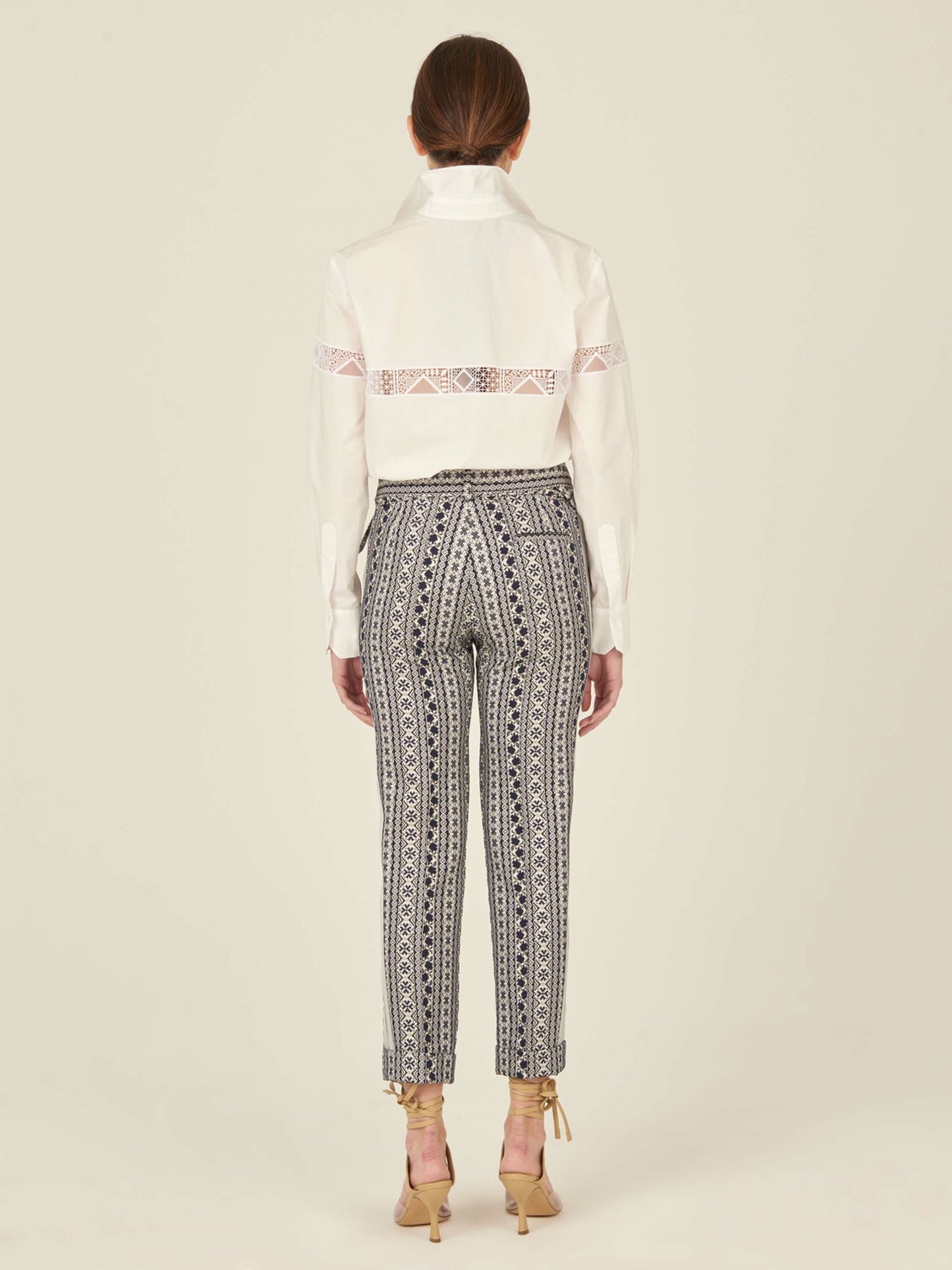 A white Andrea Shirt White with embroidery detail.