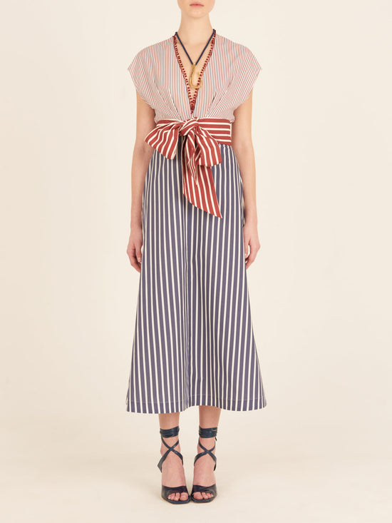 A Toledo Dress Multi Color with a red, white and blue bow, designed by Tcherassi.