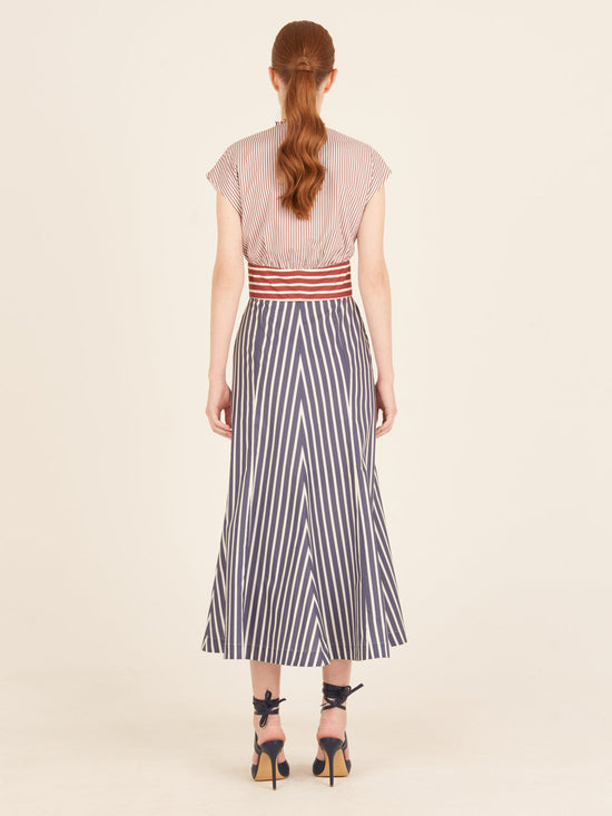 A Toledo Dress Multi Color with a red, white and blue bow, designed by Tcherassi.