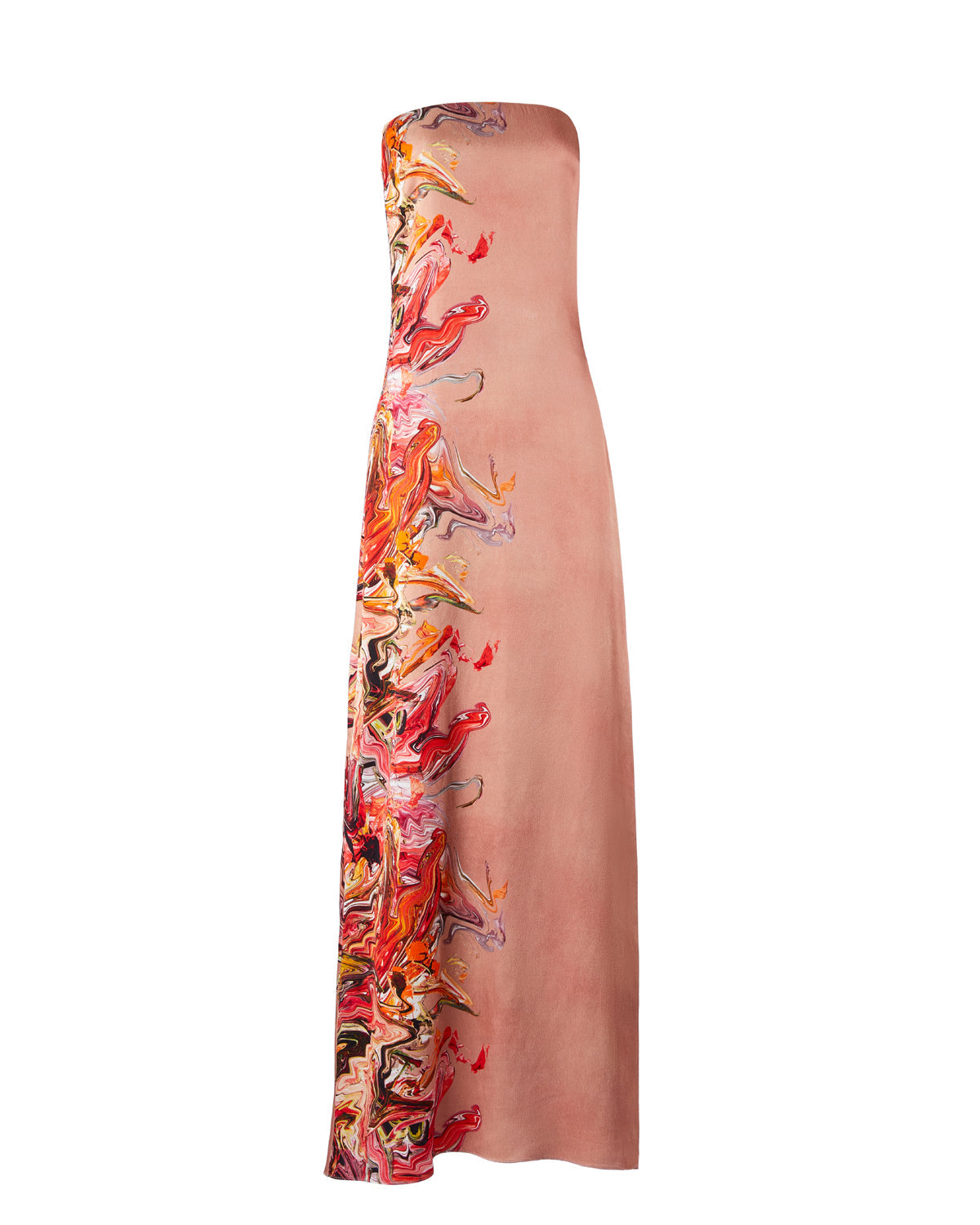 A woman stands in a long, strapless Adalgisa Dress Abstract Coral with red, orange, and yellow floral accents on the side against a plain white background. This stunning piece is available for pre-order now with an estimated ship-by date of February 1st, 2025.