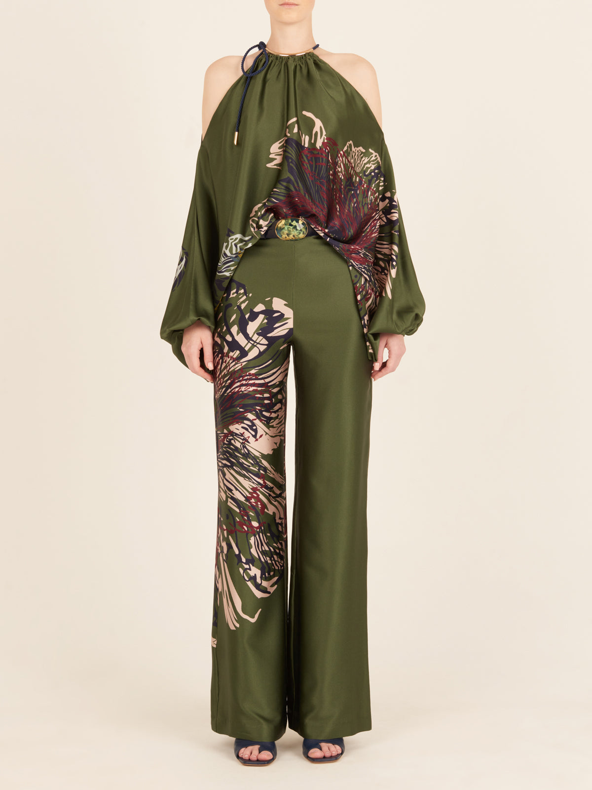 A Como Pant Green Floral, perfect for figure-flattery.