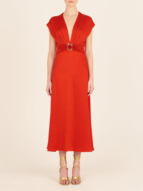 Emmeline Dress Rouge, with a belt that features a plunging neckline.