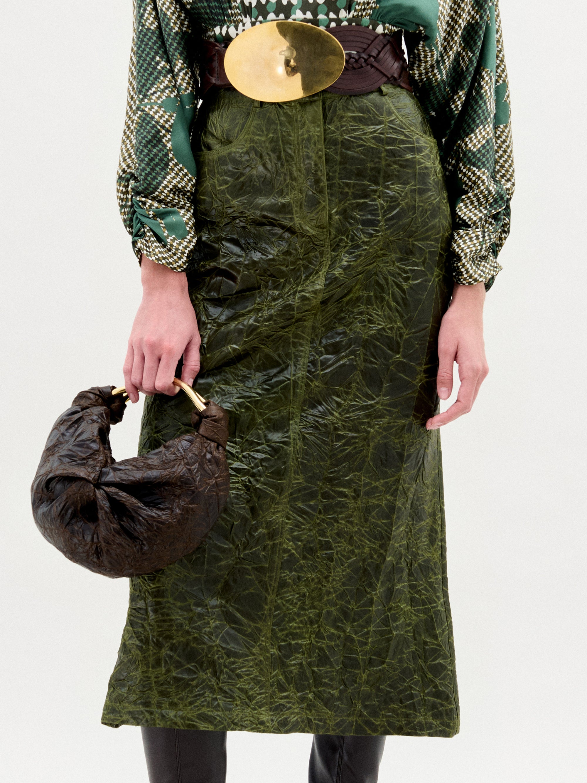 LAYAN_SKIRT_-_HUNTER_GREEN_FRONT_DETAIL_FALL_2025_6d9b3fcc-72de-4b23-b06e-a6a6211d0e57