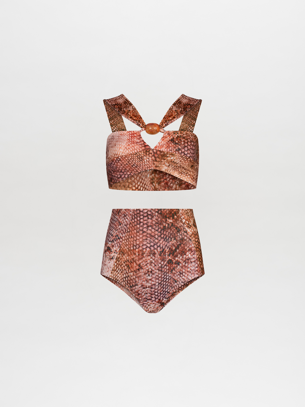 A person wearing an Olga Top & Hilaria Bikini Bottom Peach Animal Print and matching hat, holding a brown bag, standing against a plain background. Pre-order now to ensure arrival by the ship-by date of November 15th, 2024.