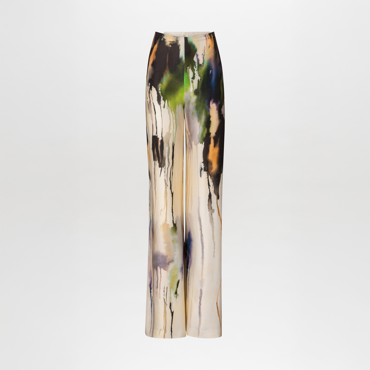 El Pantalón Palermo es de tiro alto y bota ancha, con estampado abstracto de gotas de pintura en negro, verde, naranja y morado sobre fondo crema liso.