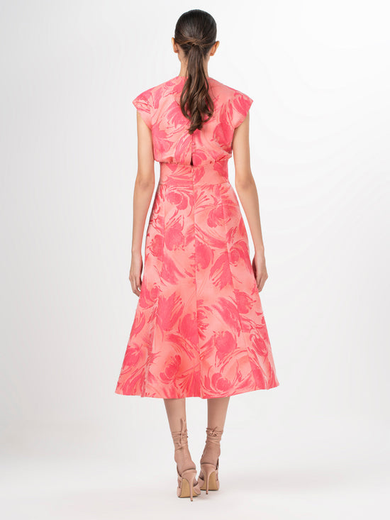 A Acalia Dress Fuchsia Pink with a floral print and V neckline.