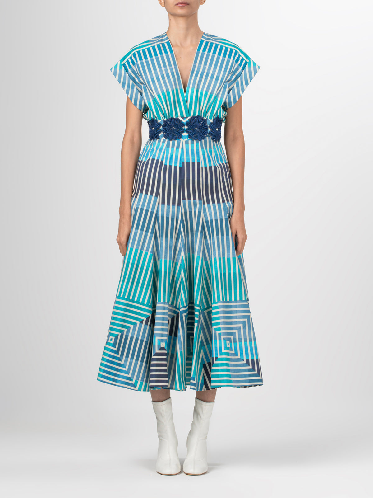 A Adila Dress Infinite Blue Stripes with a belt.