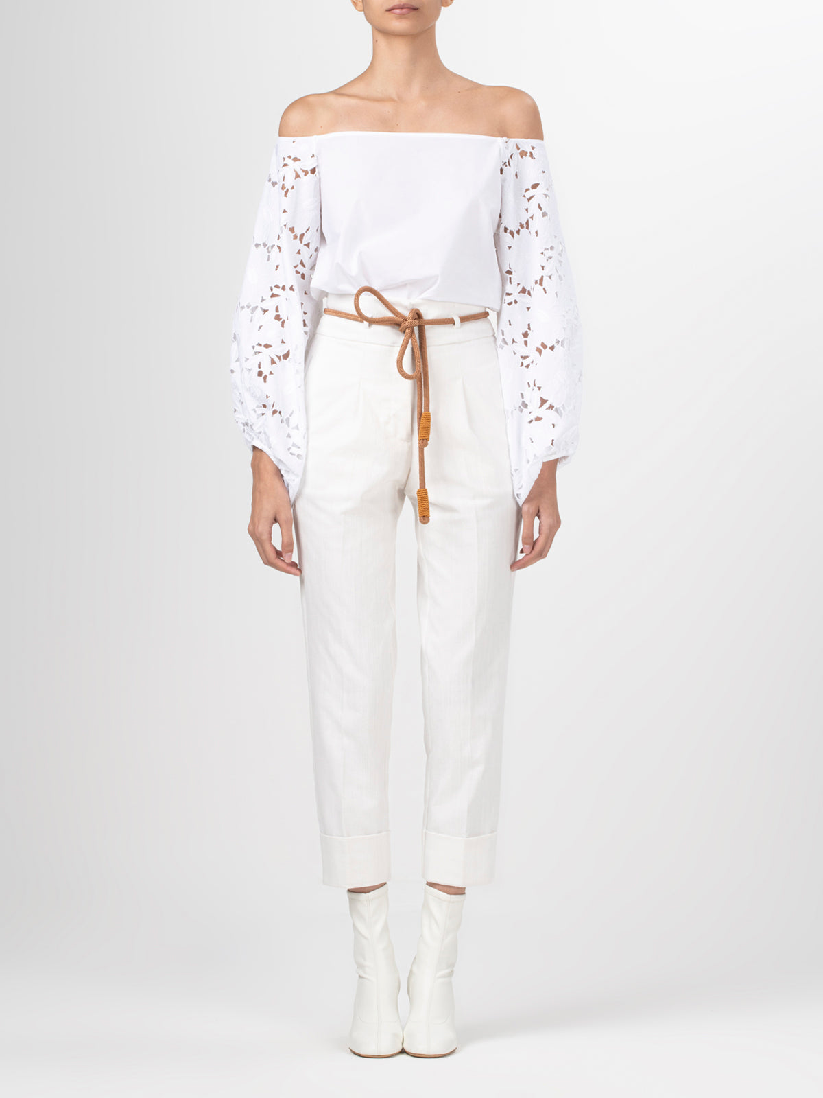 A white Stephanie Blouse White with lace bishop sleeves.