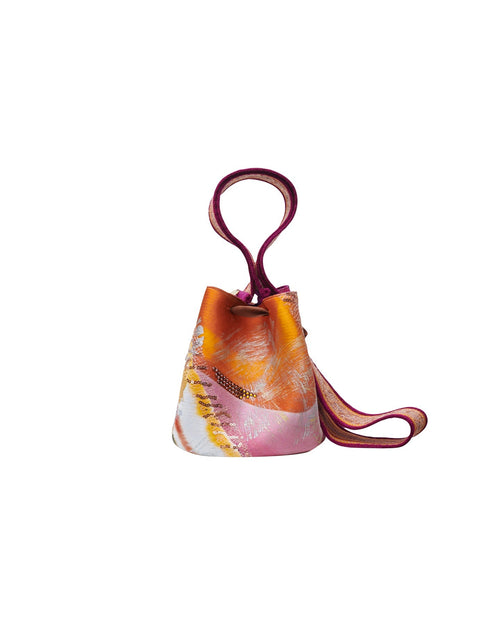 A Mochila Laaput Small Trinitaria handbag with a handle.